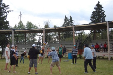 Young athletes killed time between events hitting the volleyball around. 